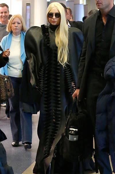 Lady Gaga is dressed in all black as she tests some perfume in Los Angeles