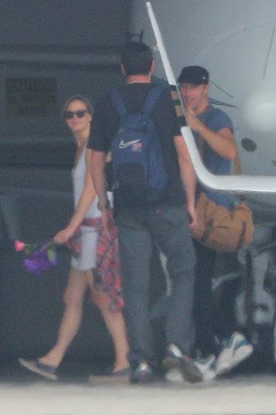 *EXCLUSIVE* Jennifer Lawrence and Chris Martin fly back to L.A. together in a private jet  **NO WEB FOR 24 HOURS, EMBARGO ENDS 10:30 AM PST ON 9/23/14**
